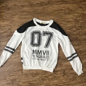 White sweater with lettering